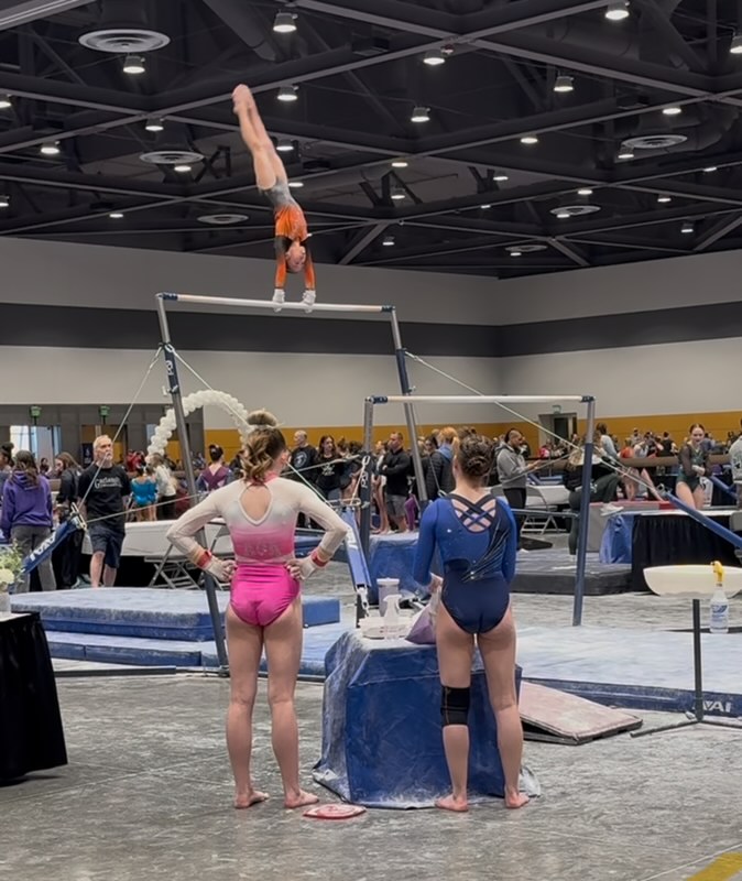 A gymnast competing